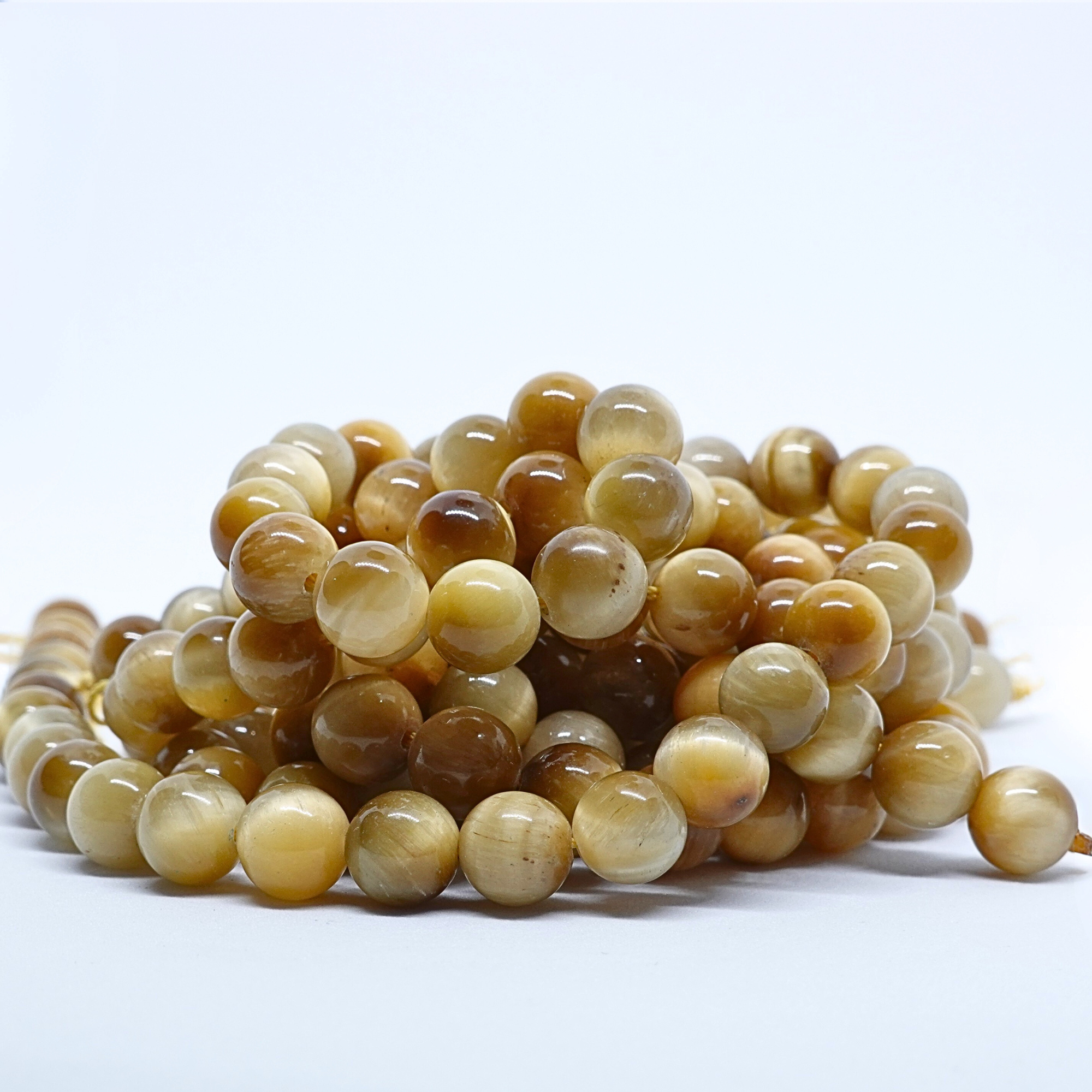 Oeil de Tigre Gold - Rang de perles rondes sur fil en 6 ou 8 mm - Grade AA - Brésil Lovaneo grossiste perle semi precieuse