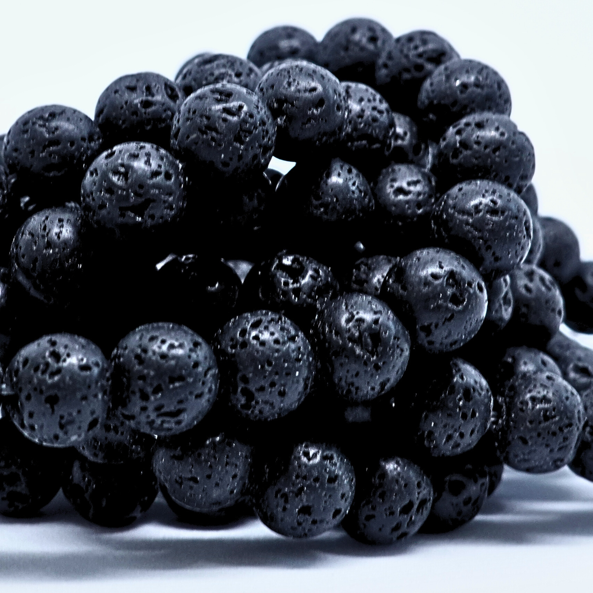 Pierre de Lave - Rang de perles rondes sur fil en 6 ou 8 mm - Grade A Lovaneo grossiste perle semi precieuse