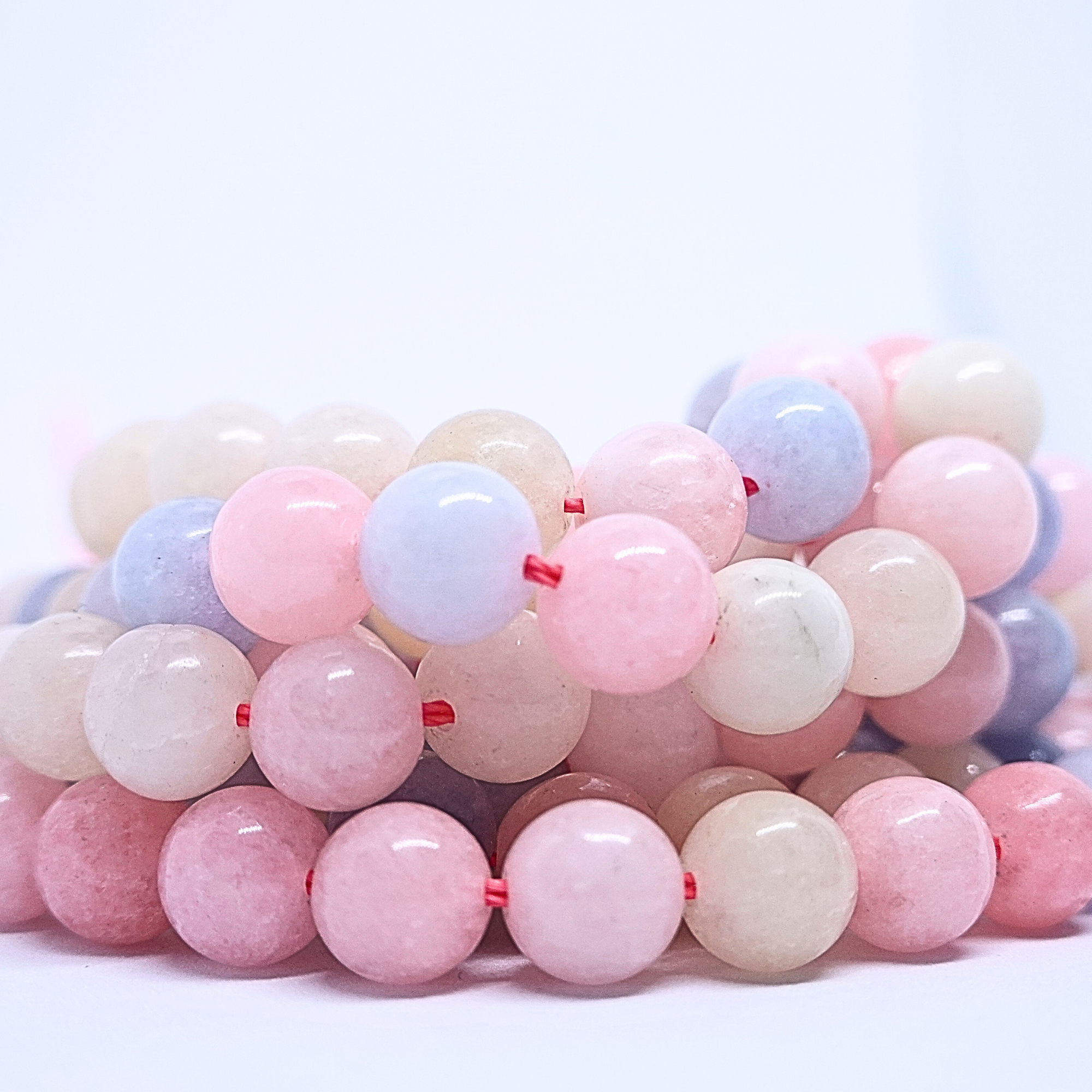 Morganite - Rang de perles rondes sur fil en 6 ou 8 mm - Grade A - Brésil Lovaneo grossiste perle semi precieuse