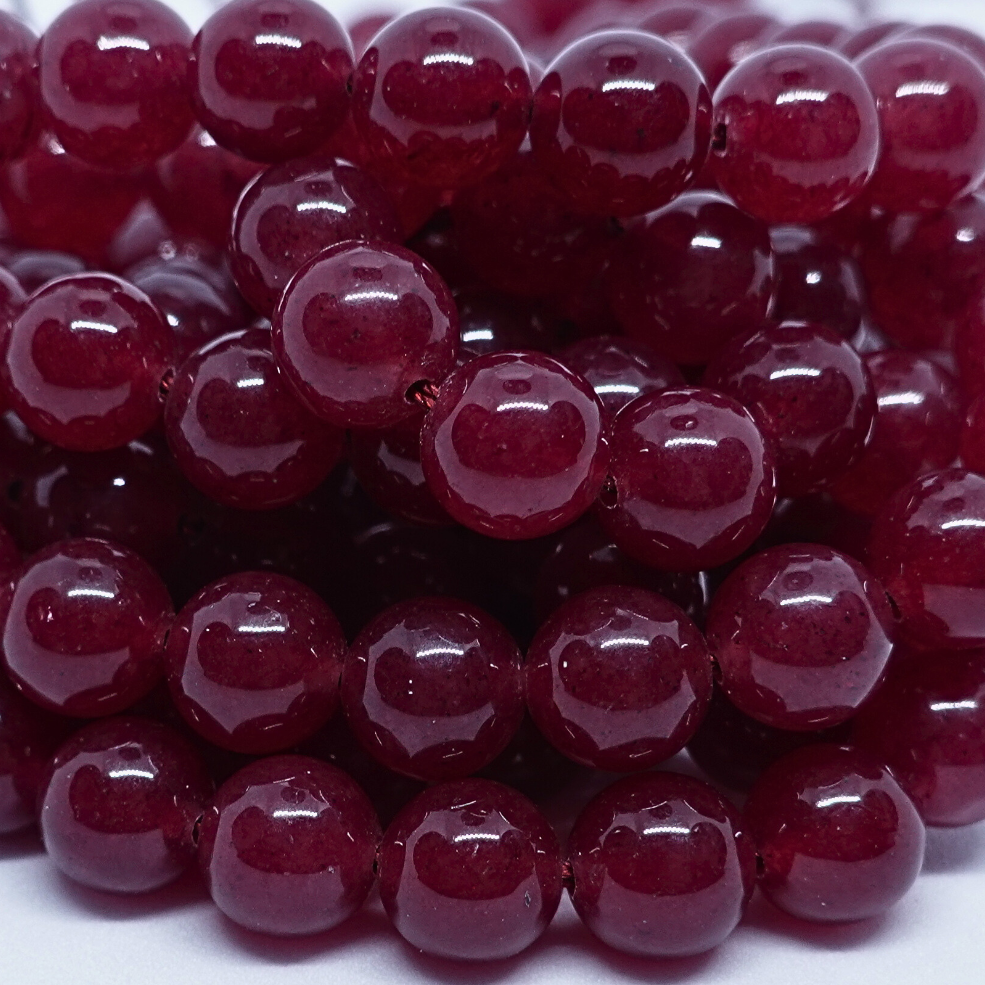 Rubis - Rang de perles rondes sur fil en 6 ou 8 mm - Grade A Lovaneo grossiste perle semi precieuse