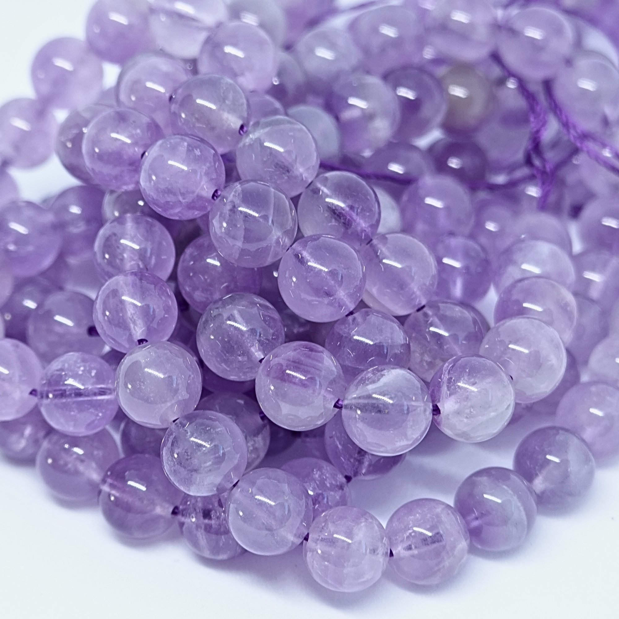 Améthyste - Rang de perles rondes sur fil en 6 ou 8 mm - Grade A Lovaneo grossiste perle semi precieuse