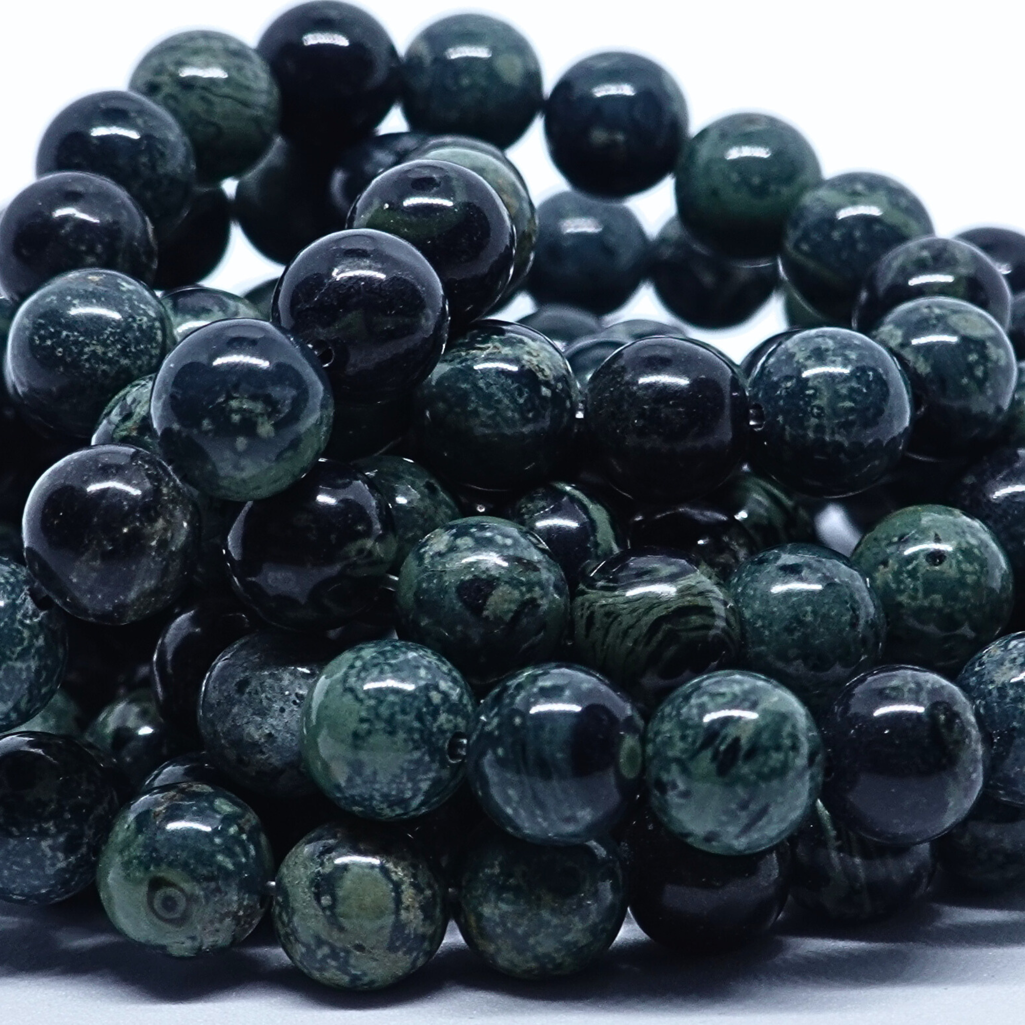 Jaspe Kambaba - Rang de perles rondes sur fil en 6 ou 8 mm - Grade A - Madagascar Lovaneo grossiste perle semi precieuse