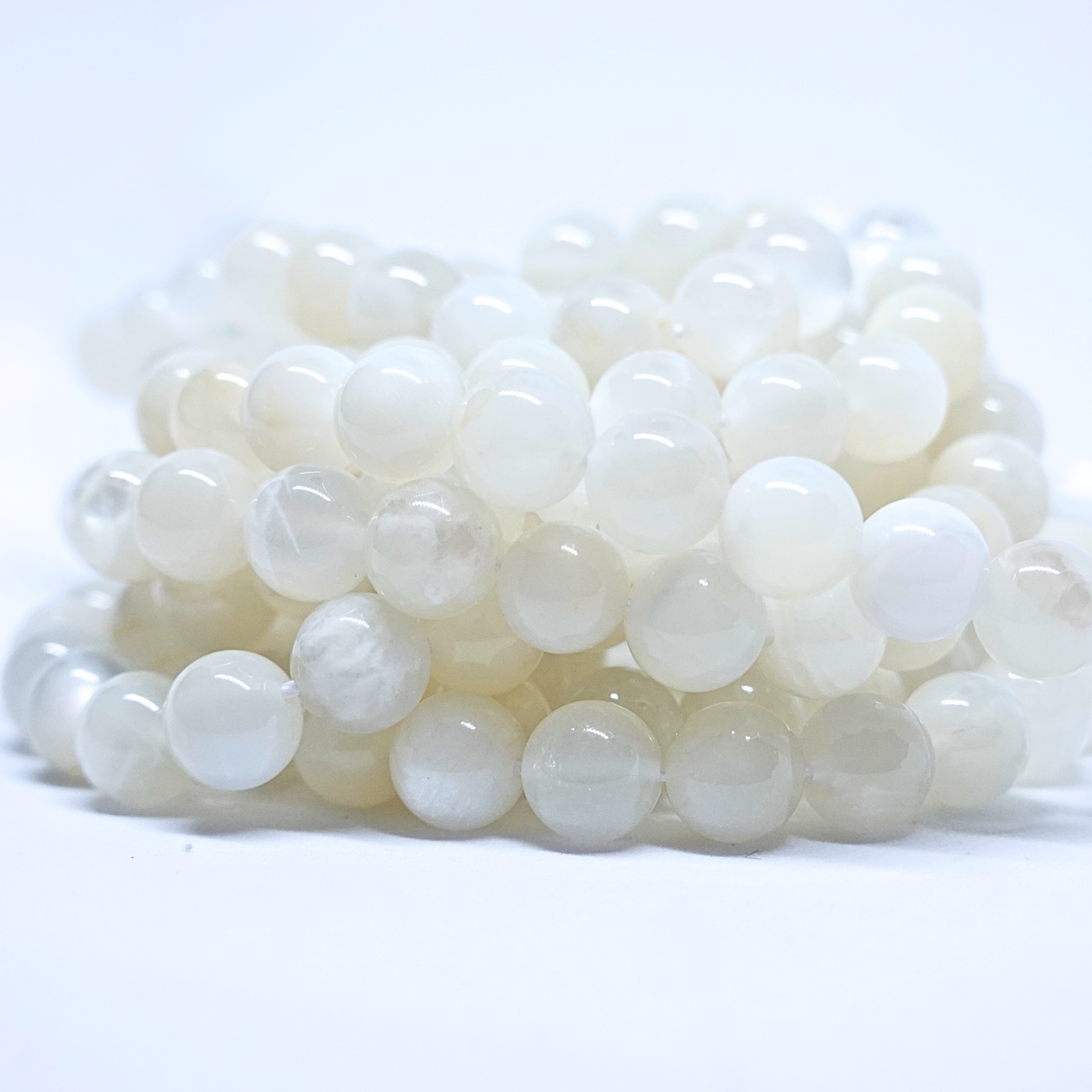 Pierre de Lune blanche - Rang de perles rondes sur fil en 6 ou 8 mm - Grade A