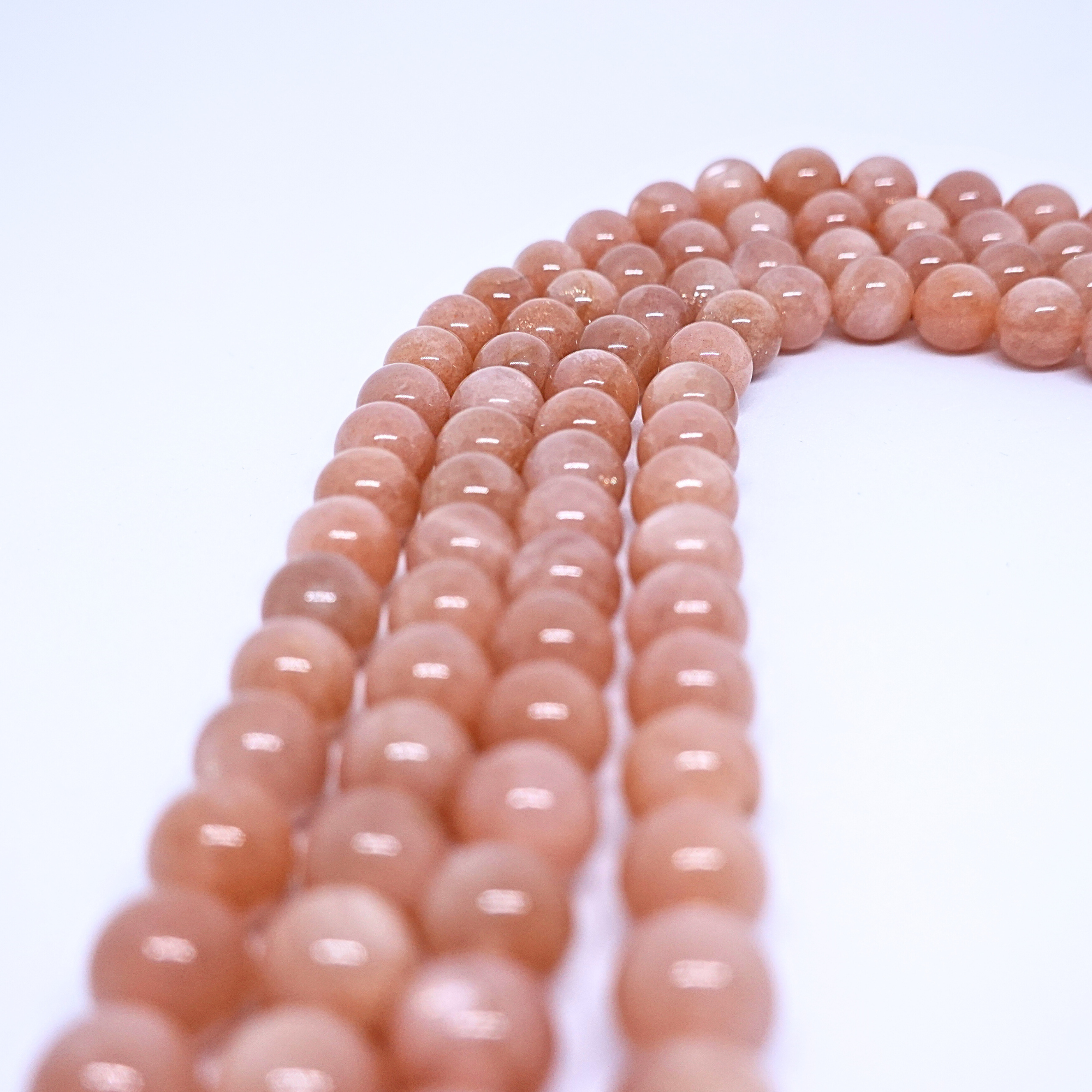 Pierre de lune orange - Rang de perles rondes sur fil en 6 ou 8 mm - Grade AA