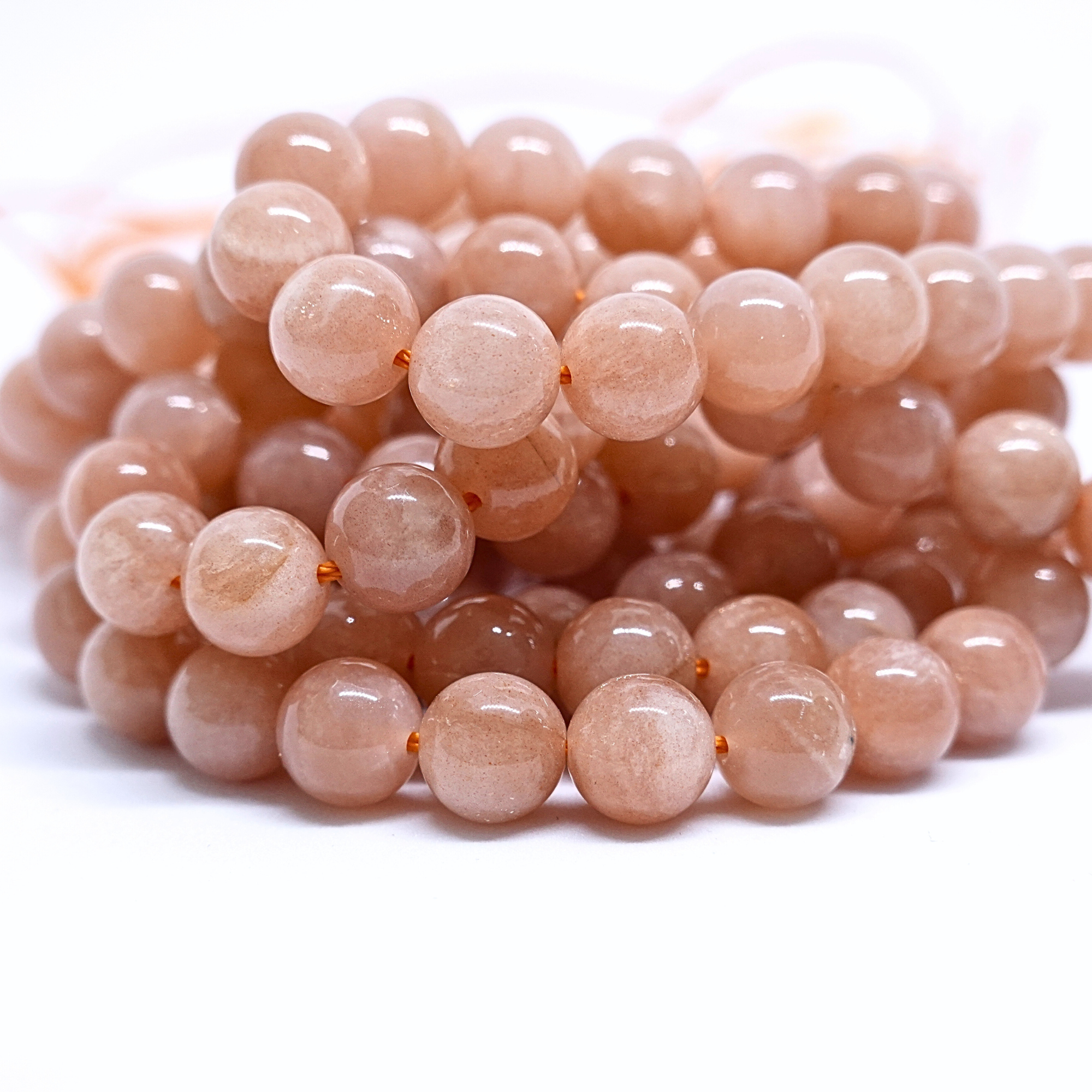 Pierre de lune orange - Rang de perles rondes sur fil en 6 ou 8 mm - Grade AA