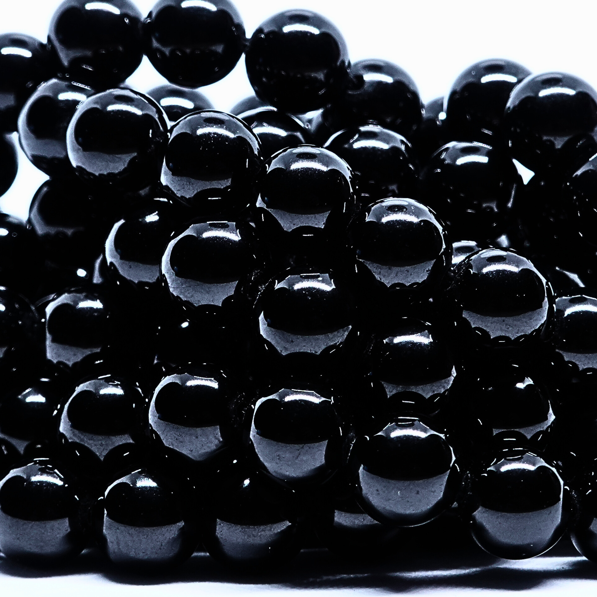 Spinelle Noir - Rang de perles rondes sur fil en 6 ou 8 mm - Grade Regular