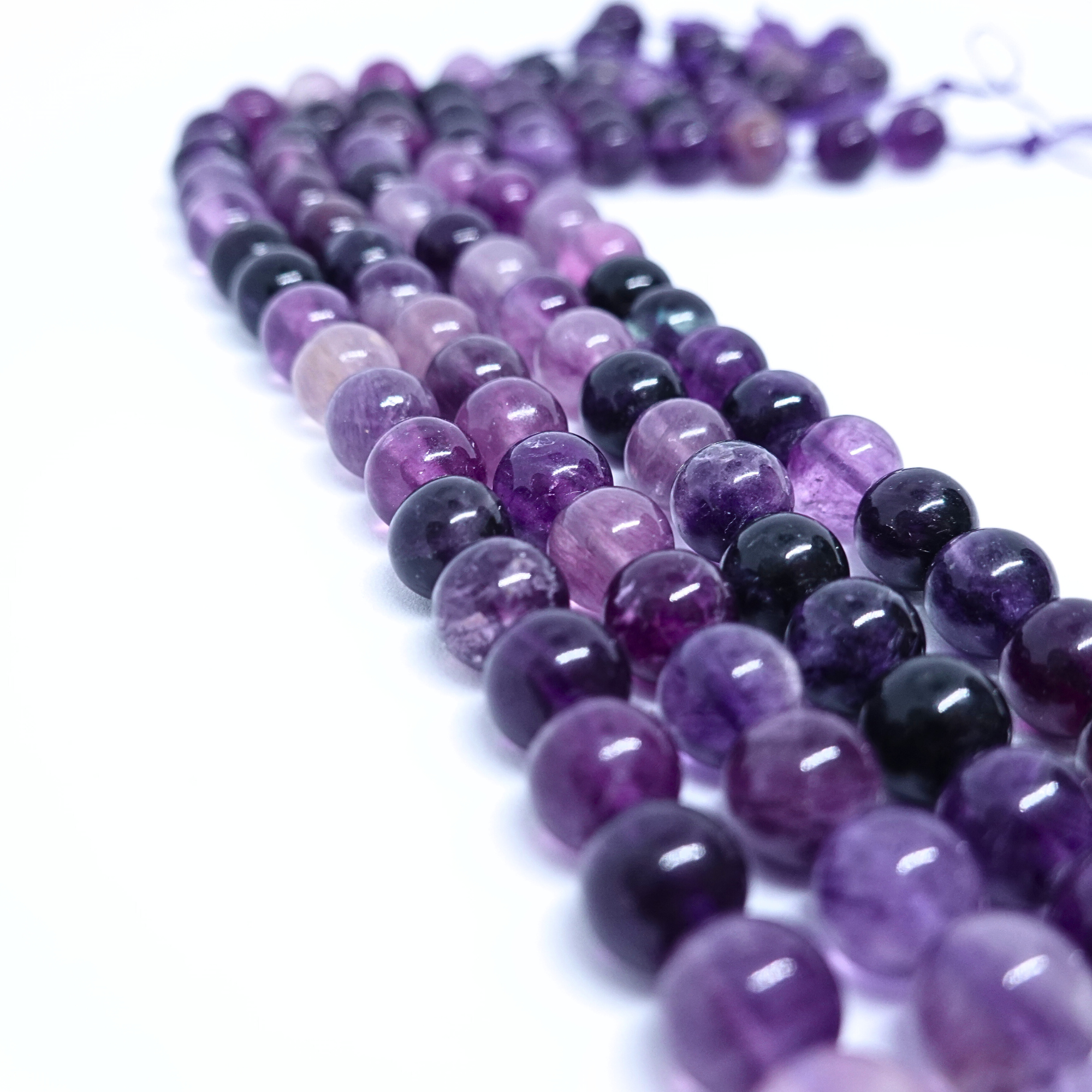 Fluorite Violette - Rang de perles rondes sur fil en 6 ou 8 mm - Grade A