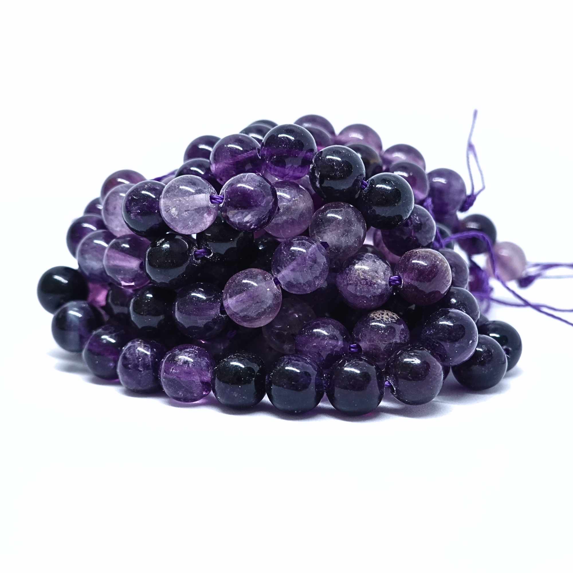 Fluorite Violette - Rang de perles rondes sur fil en 6 ou 8 mm - Grade A
