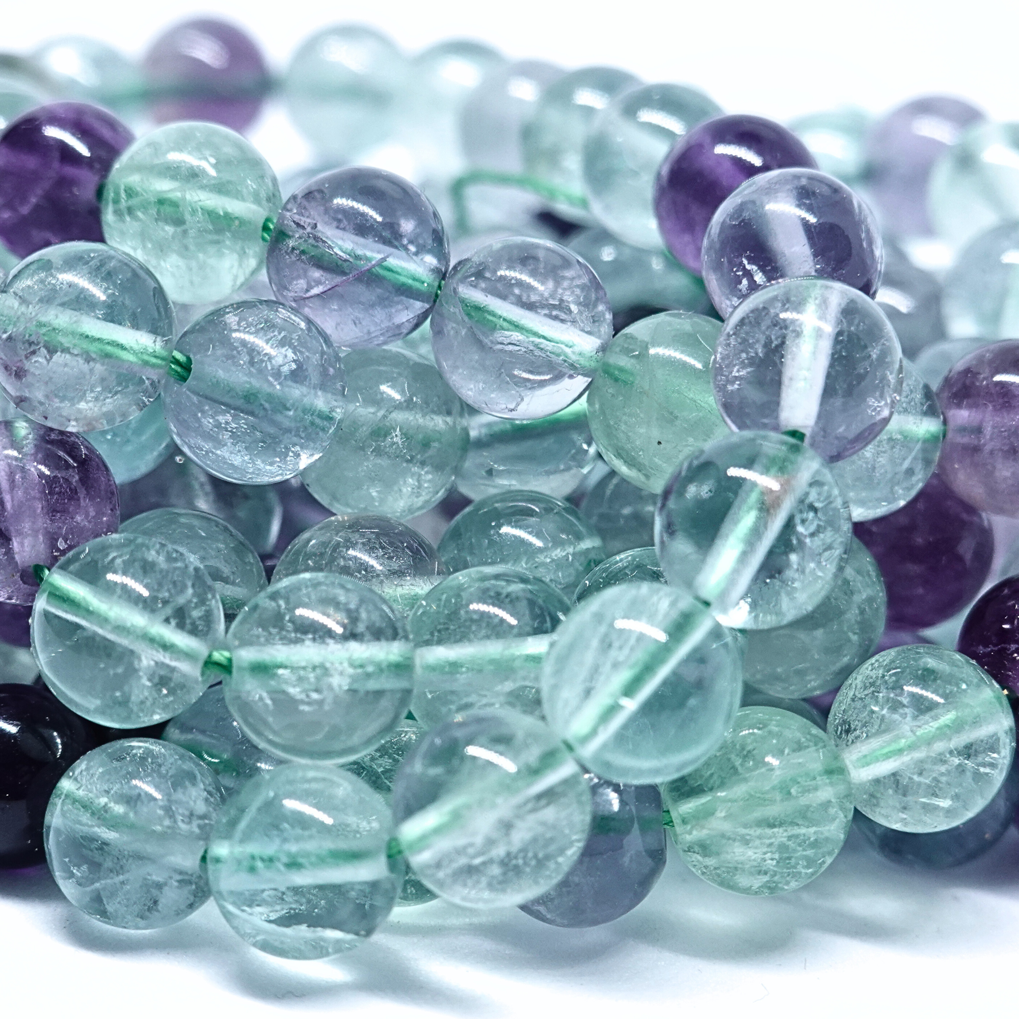 Fluorite Multicolore - Rang de perles rondes sur fil en 6 ou 8 mm - Grade A
