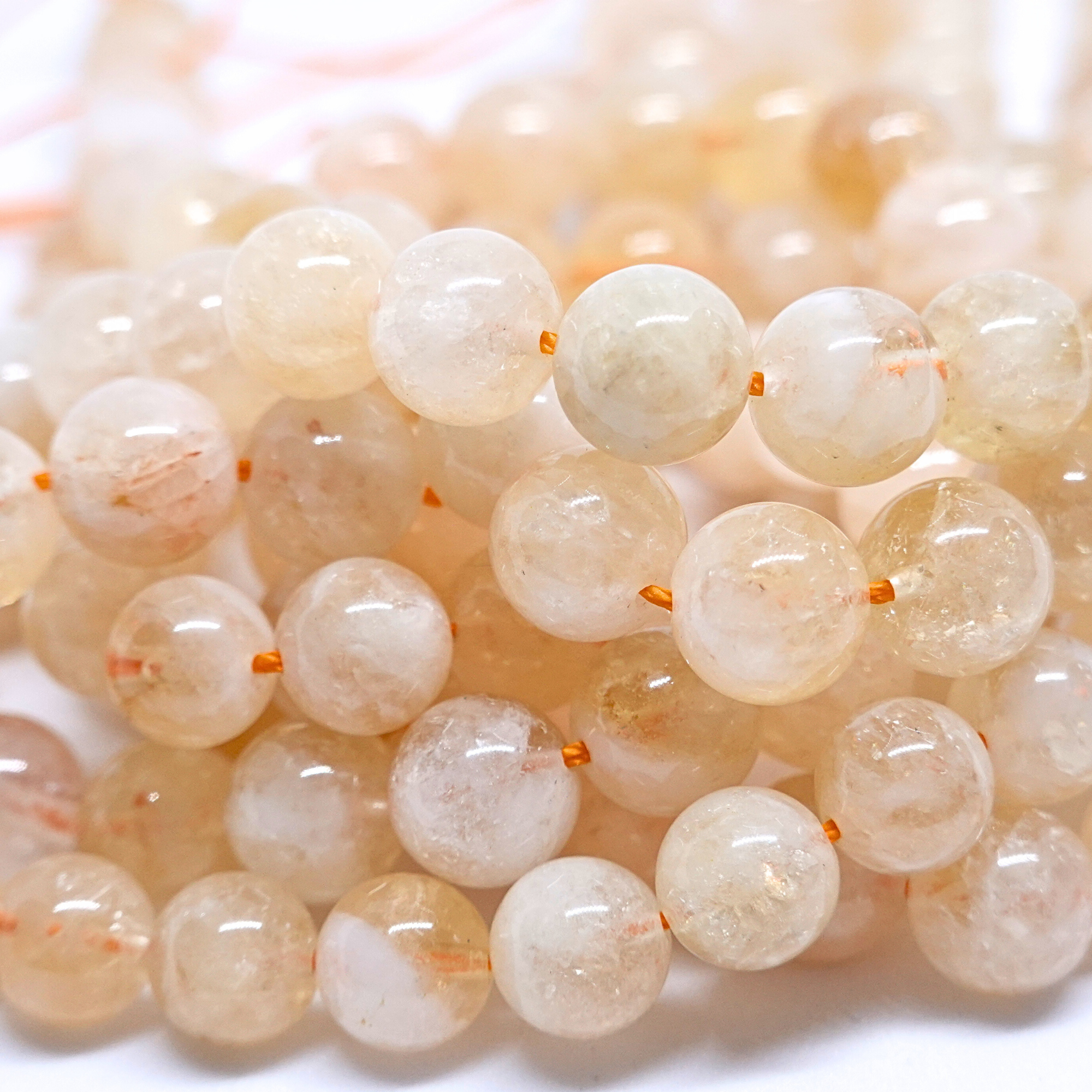 Citrine Naturelle - Rang de perles rondes sur fil en 6 ou 8 mm - Grade Regular