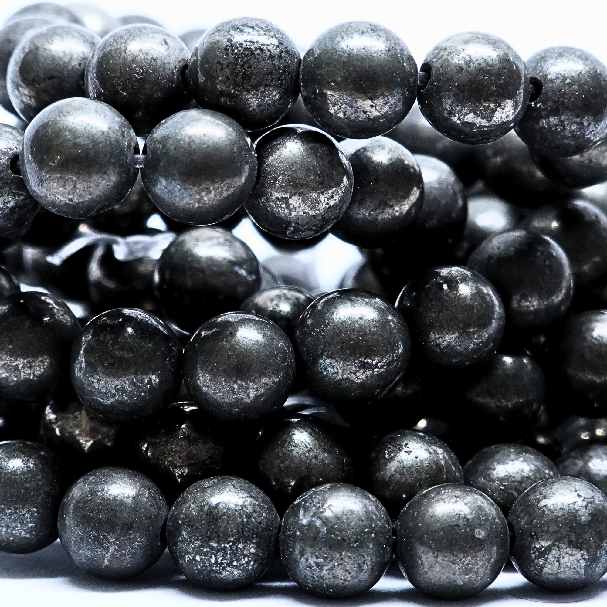 Pyrite - Rang de perles rondes sur fil en 6 ou 8 mm - Grade Regular