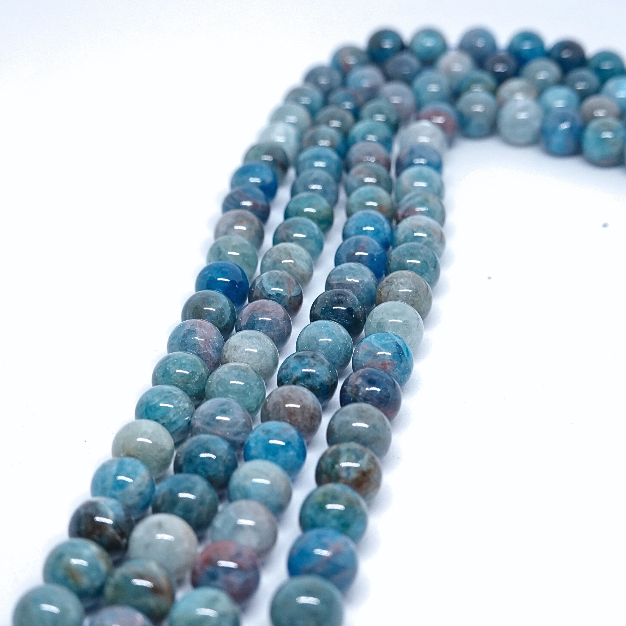 Apatite Bleue - Rang de perles rondes sur fil en 6 ou 8 mm - Grade Regular