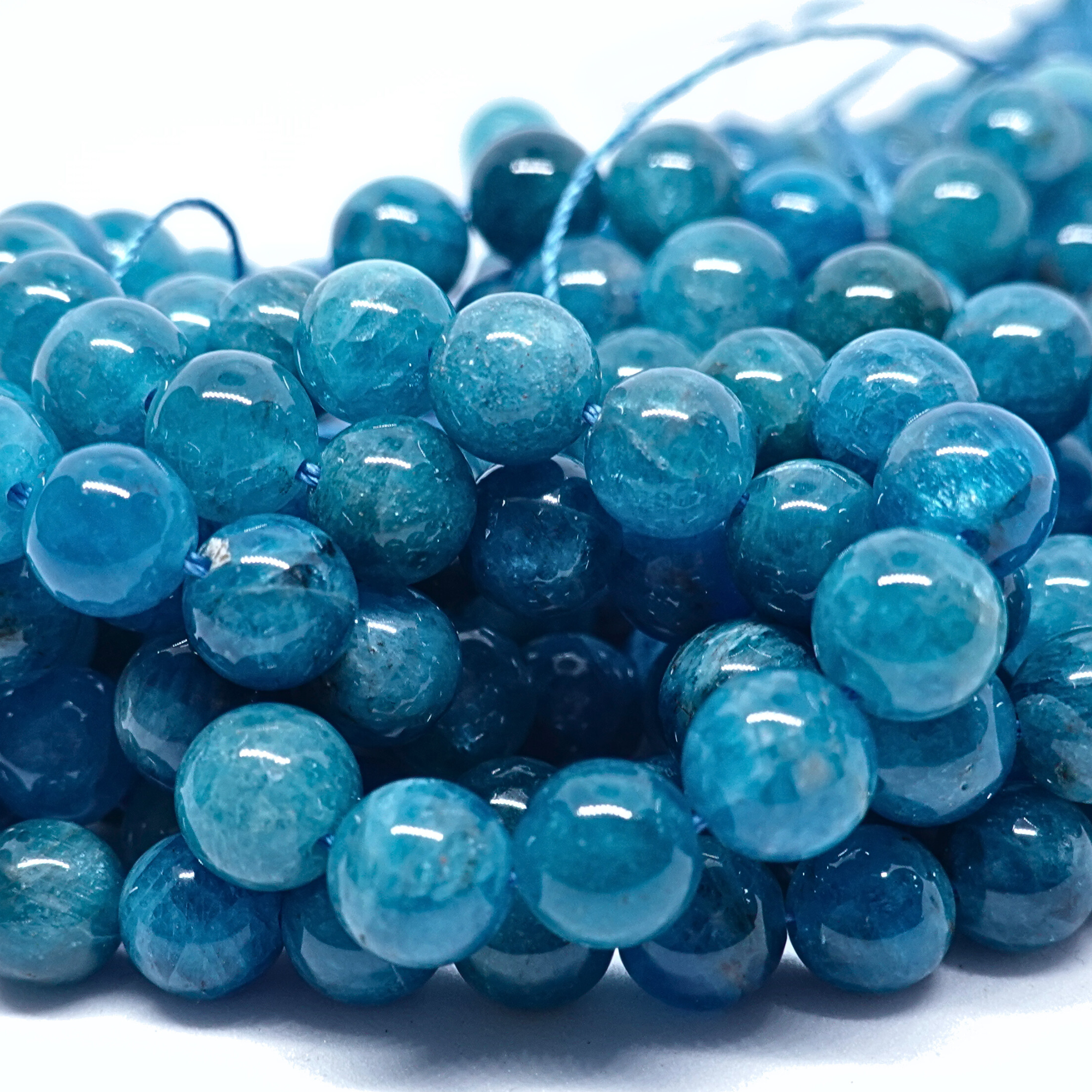 Apatite Bleue - Rang de perles rondes sur fil en 6 ou 8 mm - Grade AA