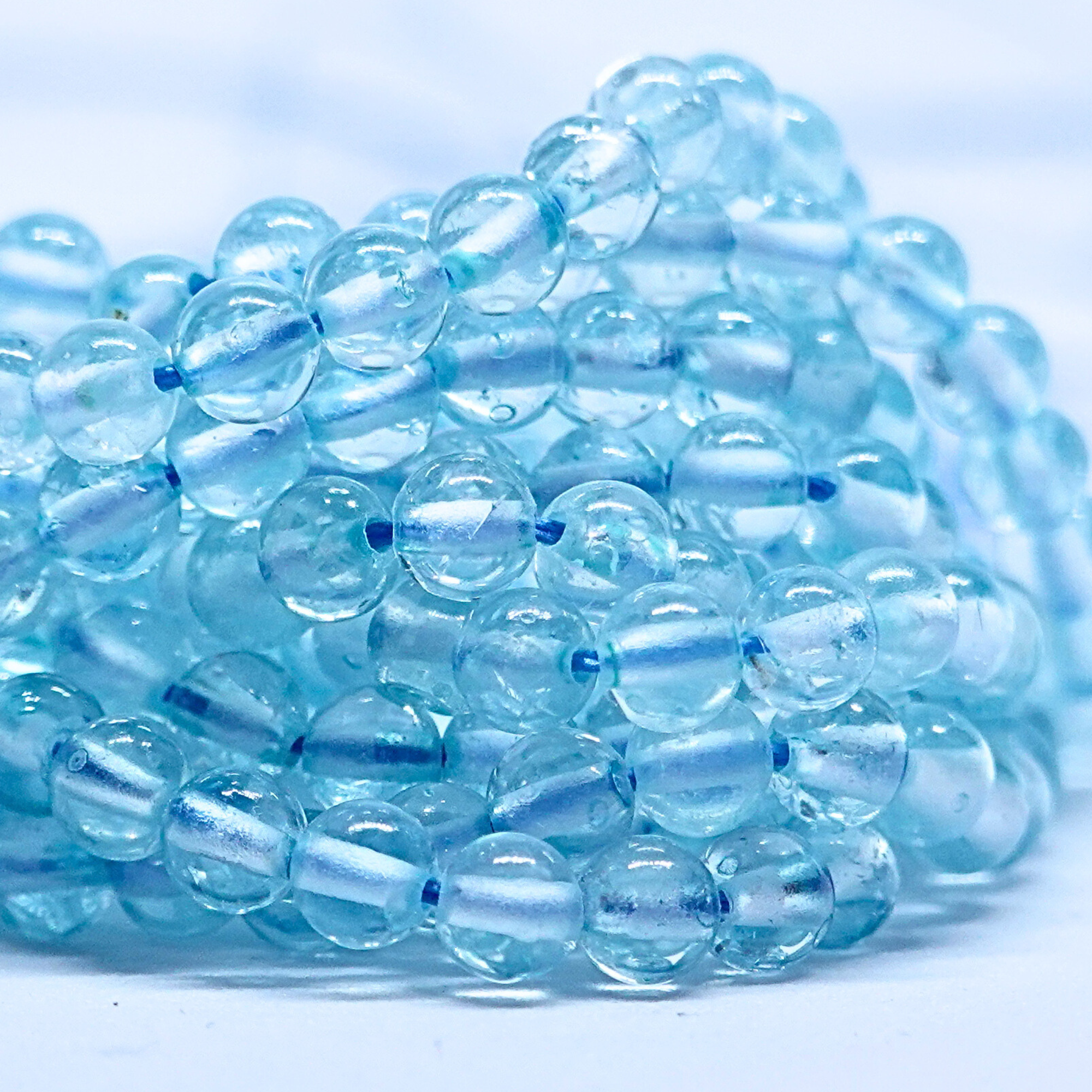 Topaze Bleue - Rang de perles rondes sur fil en 3-3.5 mm ou 4-4.5 mm - Grade AA