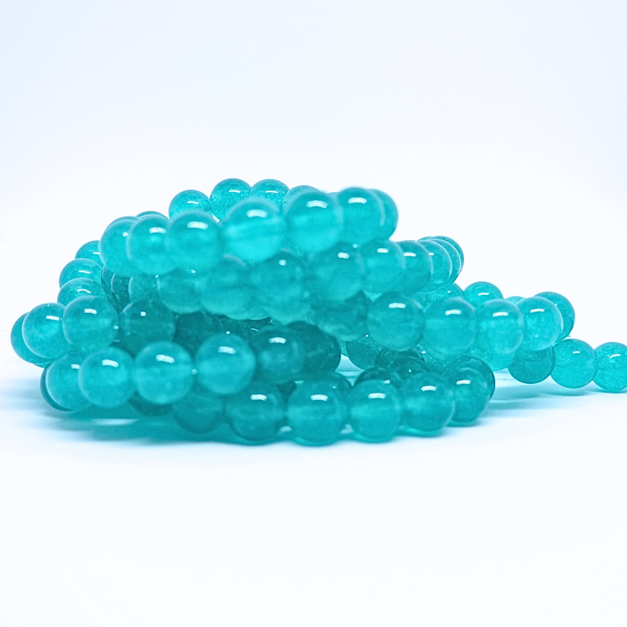 Topaze Bleue - Rang de perles rondes sur fil en 6 ou 8 mm - Grade A - Brésil Lovaneo grossiste perle semi precieuse