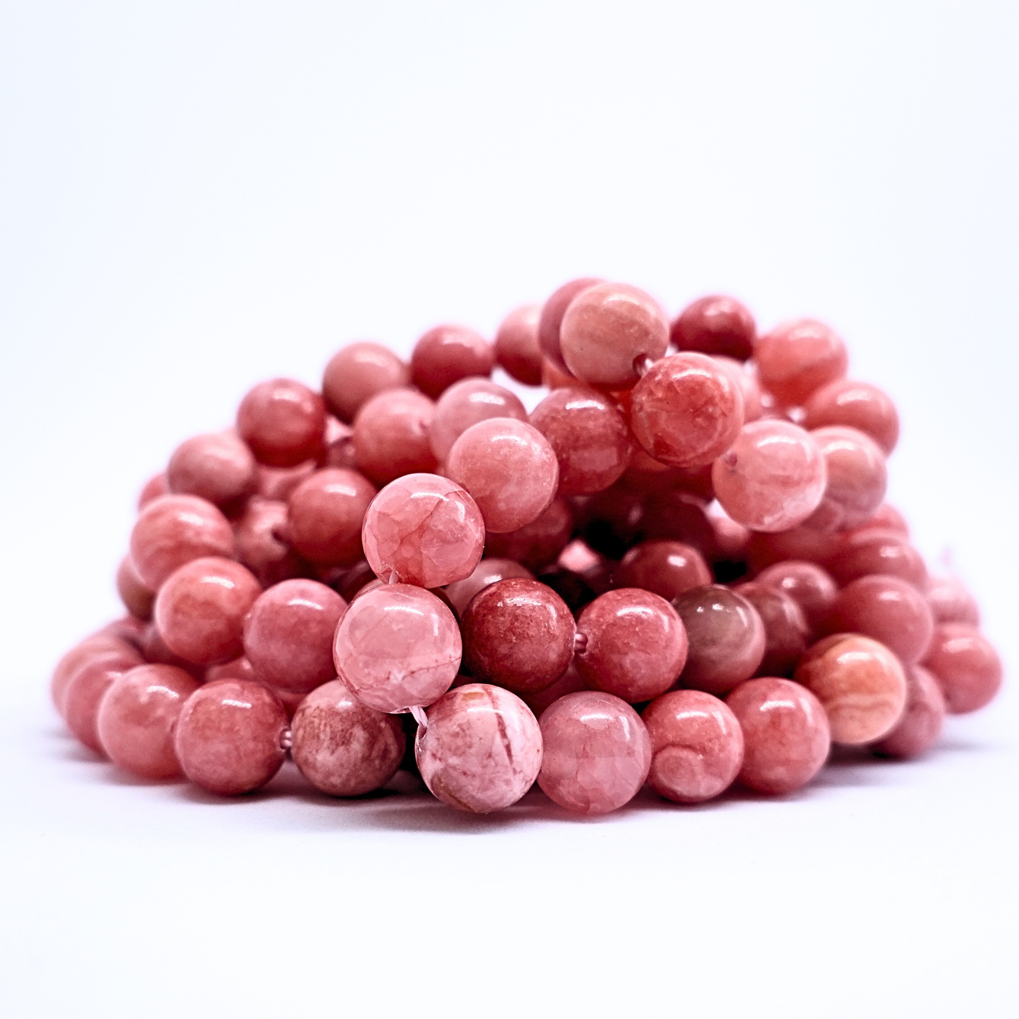 Rhodochrosite - Rang de perles rondes sur fil en 6 ou 8 mm - Grade A - Argentine Lovaneo grossiste perle semi precieuse