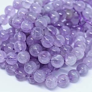 Améthyste - Rang de perles rondes sur fil en 6 ou 8 mm - Grade A