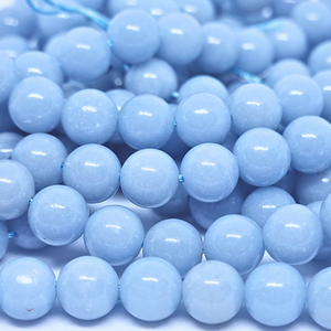 Angélite bleue - Rang de perles rondes sur fil en 6 ou 8 mm - Grade A