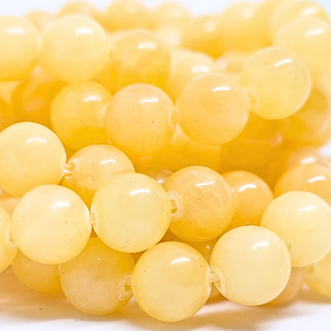 Calcite orange - Rang de perles rondes sur fil en 6 ou 8 mm - Grade A