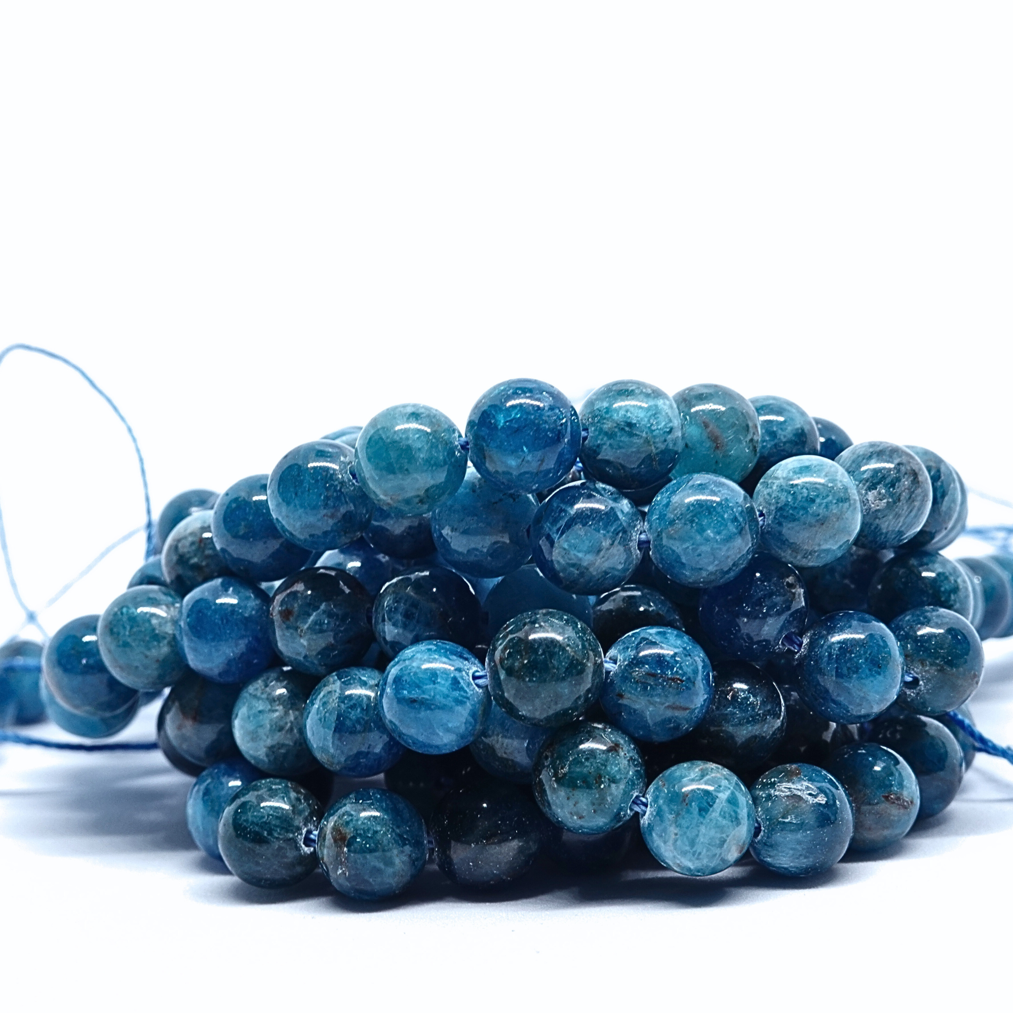 Apatite bleue - Rang de perles rondes sur fil en 6 ou 8 mm - Grade AA - Madagascar Lovaneo grossiste perle semi precieuse