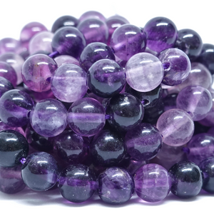 Fluorite Violette - Rang de perles rondes sur fil en 6 ou 8 mm - Grade A