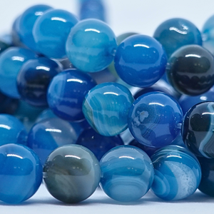 Agate Bleue - Rang de perles rondes sur fil en 6 ou 8 mm - Grade Regular