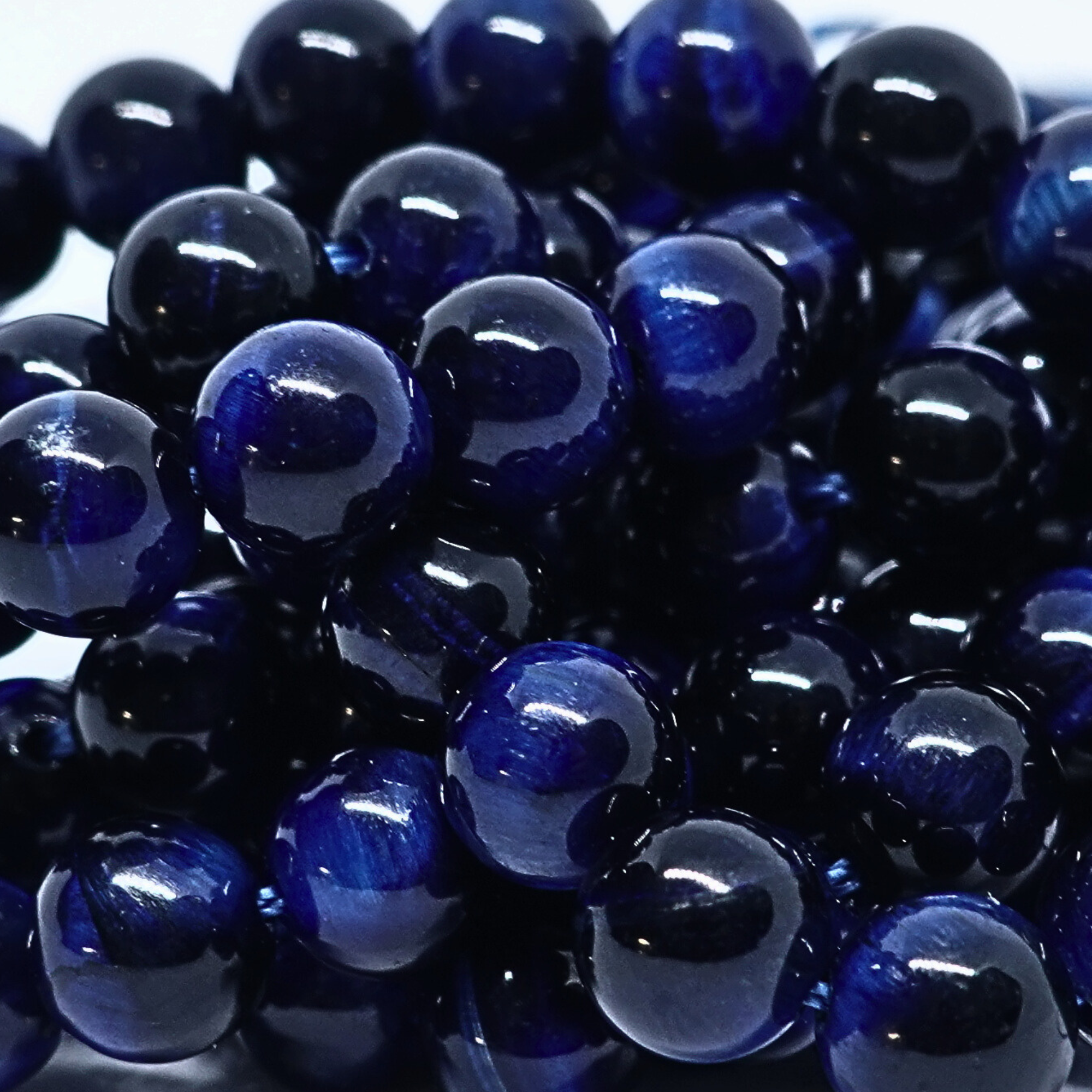 Œil du Tigre Bleu - Rang de perles rondes sur fil en 6 ou 8 mm - Grade A Lovaneo grossiste perle semi precieuse