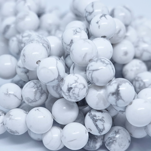 Howlite - Rang de perles rondes sur fil en 6 ou 8 mm - Grade A